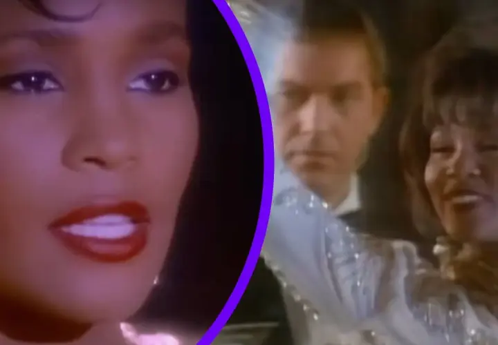 Whitney Houston w klipie "I'm Every Woman", uśmiechnięta, w błyszczącej sukni, obok mężczyzny.