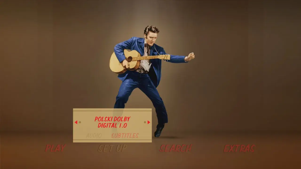 Elvis Presley w niebieskim garniturze gra na gitarze. Menu DVD z opcją "Polski Dolby Digital 1.0" i "Love Me Tender po polsku".